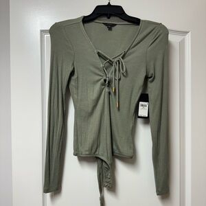 . Comfortable and stretchy brand new guess bodysuit  xs